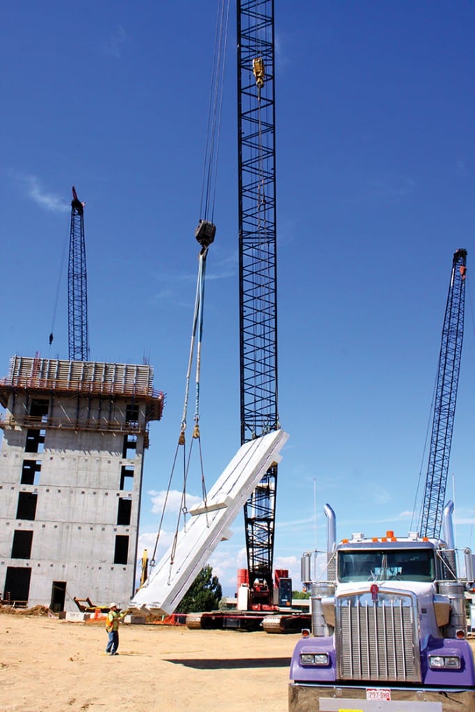 Photos courtesy Adolfson & Peterson A piece of precast concrete is delivered to the site, ready for placement. The heaviest piece weighed 32 tons.